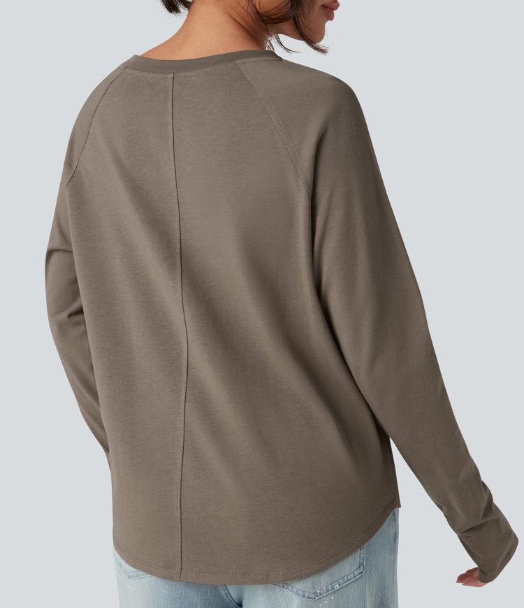 T-shirt décontracté en coton à col rond, manches longues raglan avec passants pouces et ourlet arrondi, coupe ample