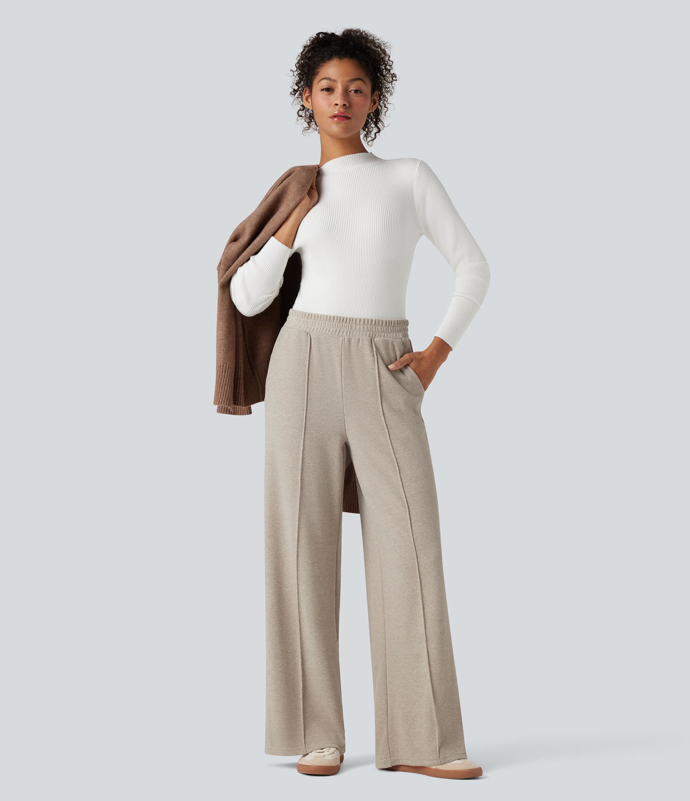 Hoch geschnittene Thermohosen mit geradem Bein und Taschen