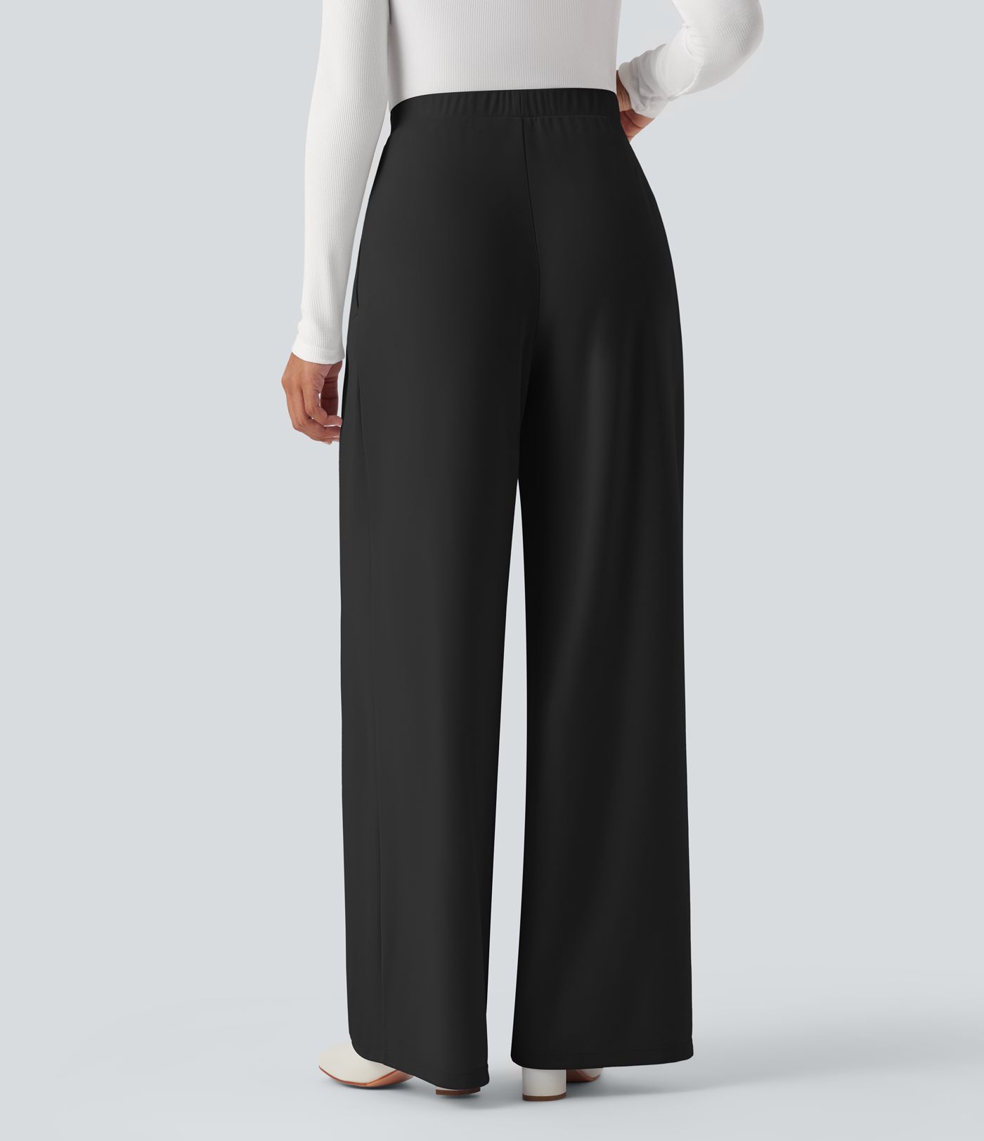 Pantalon tailleur jambes larges taille haute avec poches