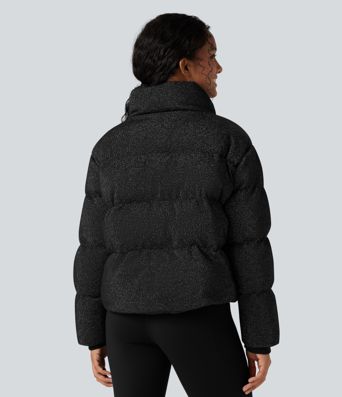 Puffer jacket with a high collar, sparkle effect, and pockets