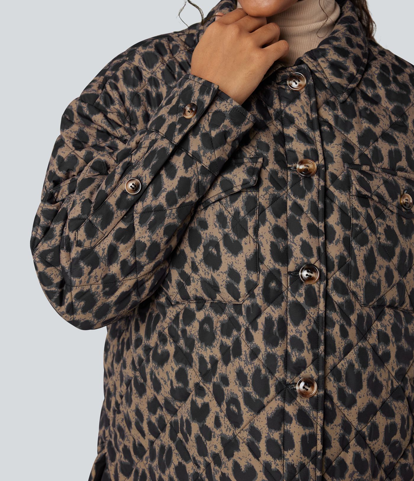 Doudoune réversible déperlante ourlet arrondi manches longues avec poches