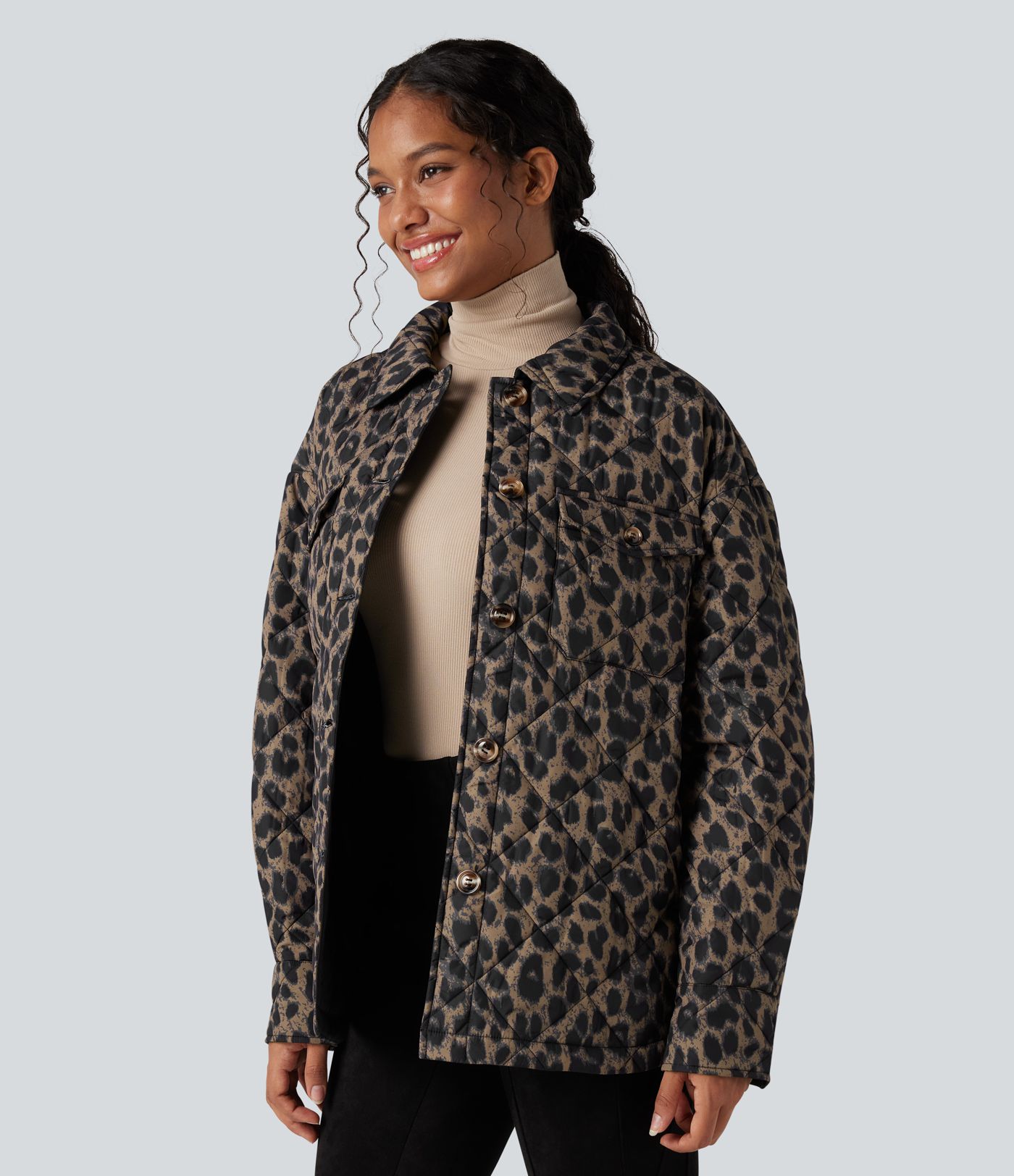 Doudoune réversible déperlante ourlet arrondi manches longues avec poches