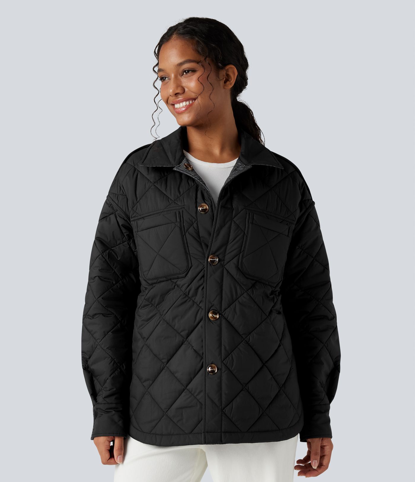 Doudoune réversible déperlante ourlet arrondi manches longues avec poches