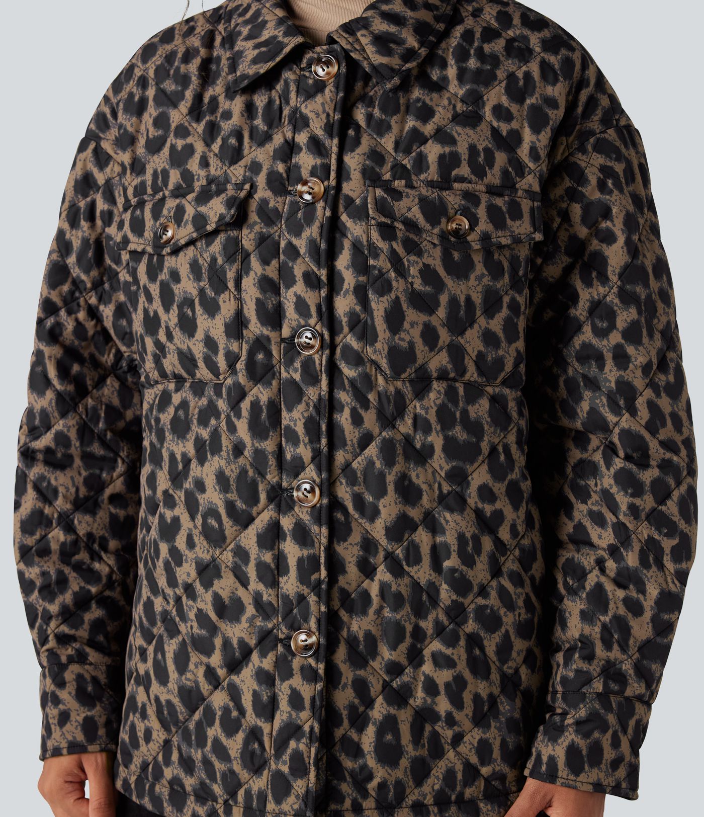 Doudoune réversible déperlante ourlet arrondi manches longues avec poches