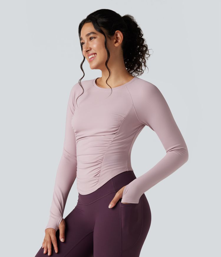 Haut de sport polaire col rond à manches longues avec passants pouces, fronces et ourlet arrondi