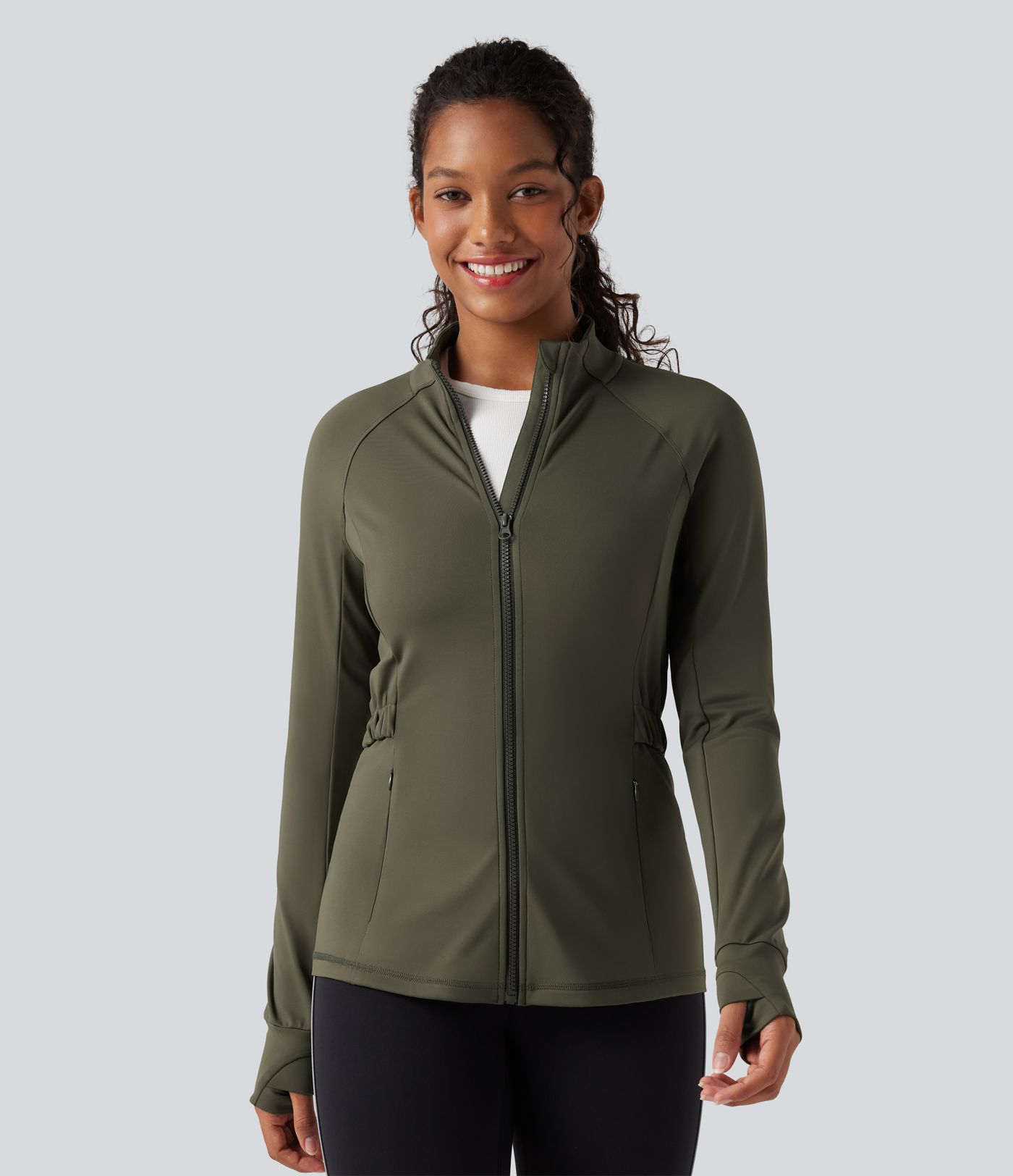 Veste polaire de randonnée déperlante col montant à manches longues avec passants pouces et poches