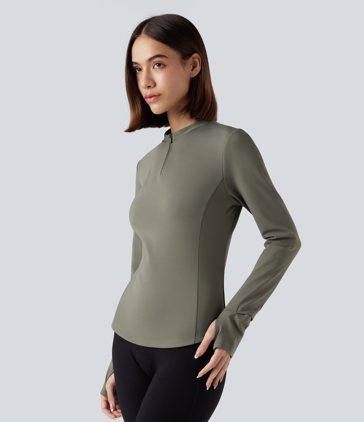 Fleece-yoga- og treningstopp med stående krage, halv glidelås, lange ermer og tommelhull