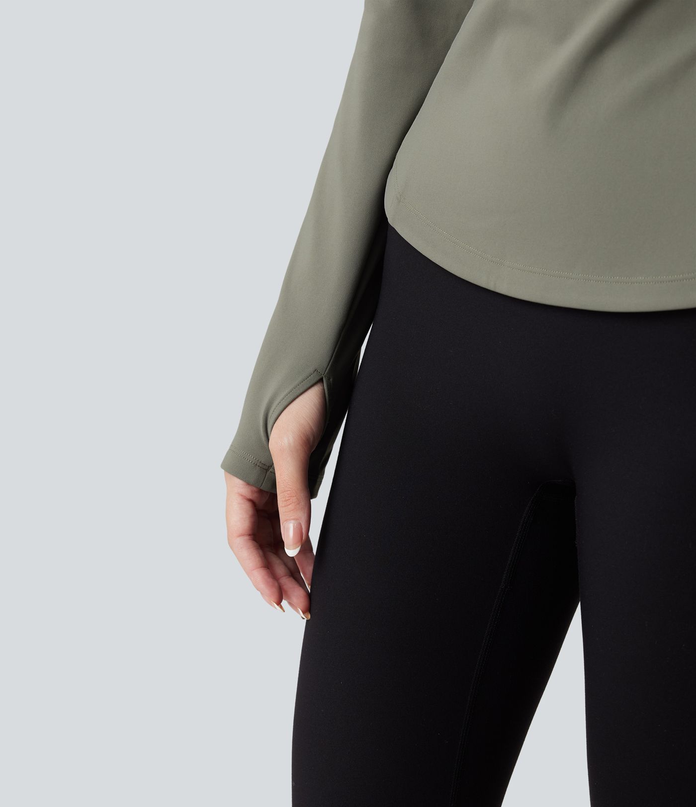 Fleece-yoga- og treningstopp med stående krage, halv glidelås, lange ermer og tommelhull