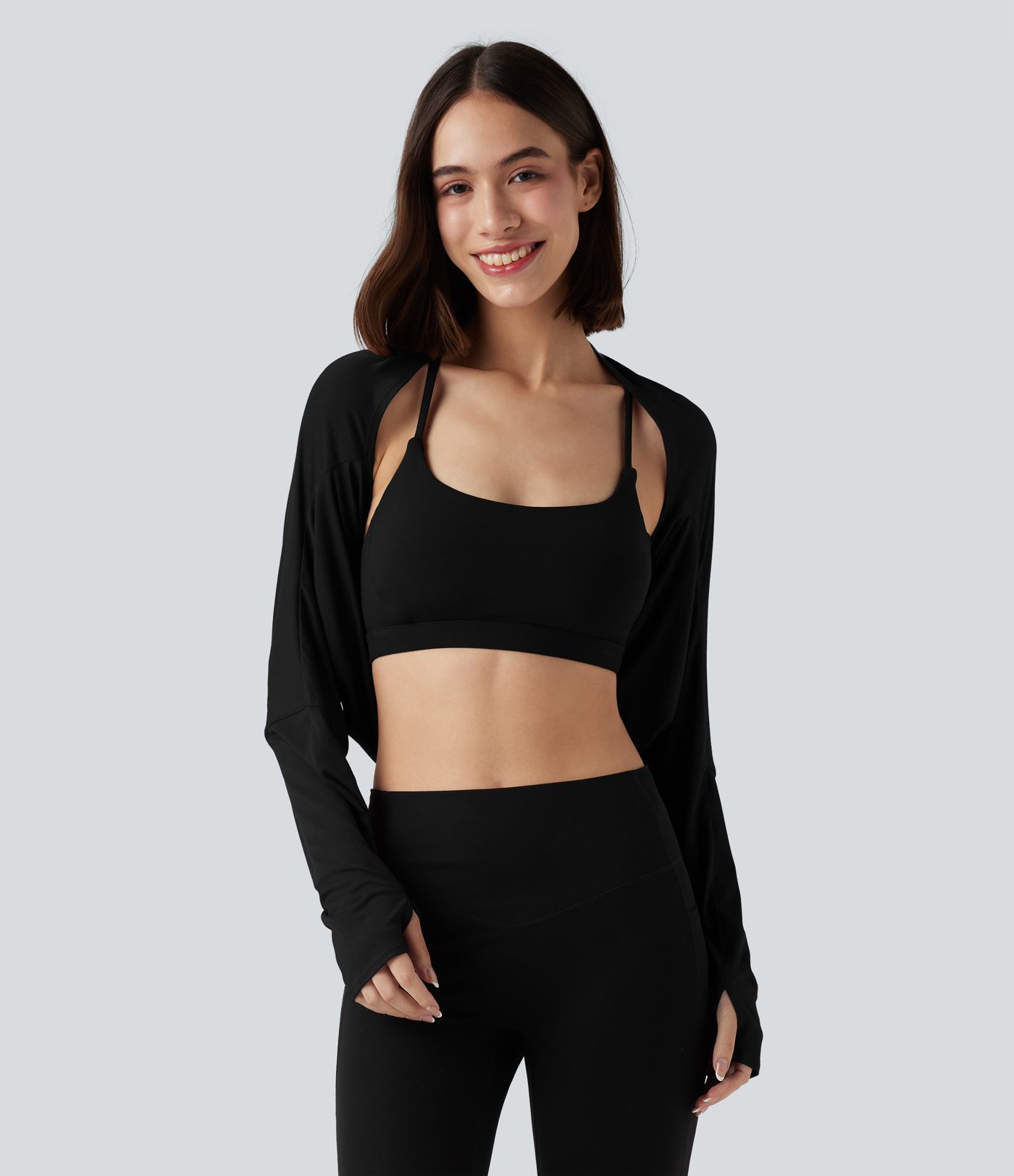 Top deportivo corto de manga larga con agujero para el pulgar