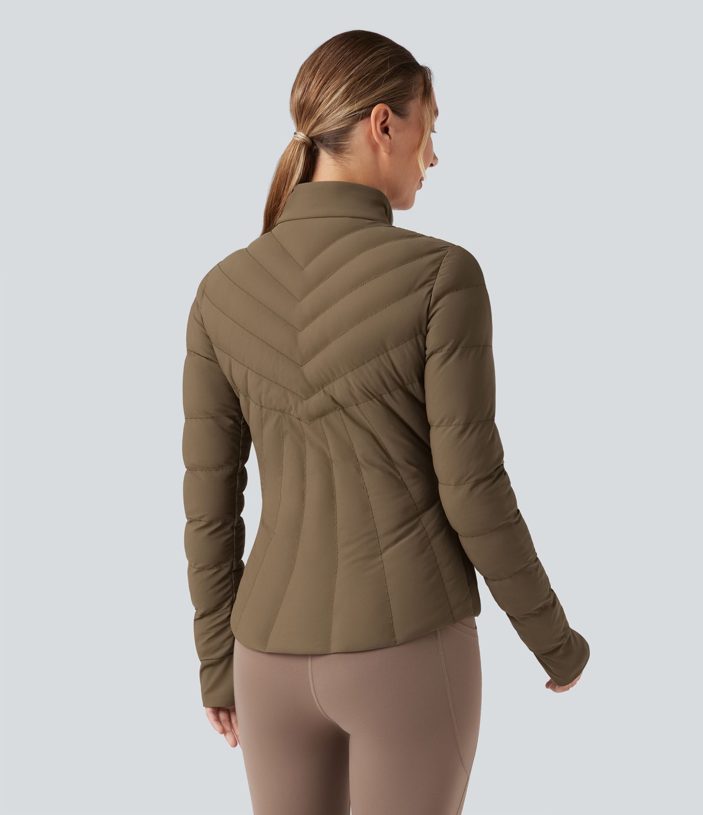 PuffFlex Stand Collar Thumb Holes Stretchy Workout Quilted Jacket with Pockets