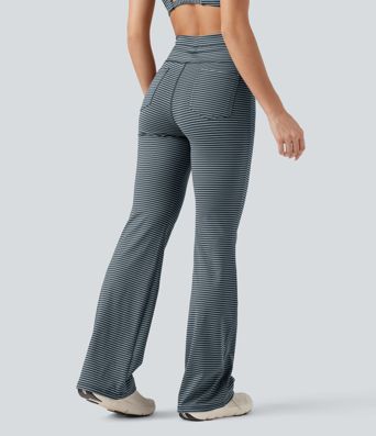 Vysoké sportovní kalhoty s pruhy, stahovací šňůrkou, rozšířeným střihem a kapsami