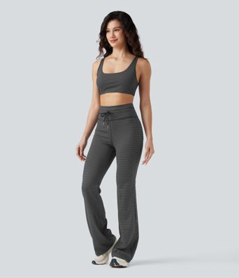 Höga midjade randiga yogabyxor med vida ben och fickor med dragsko