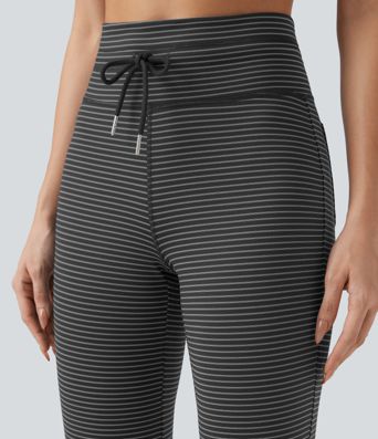 Höga midjade randiga yogabyxor med vida ben och fickor med dragsko