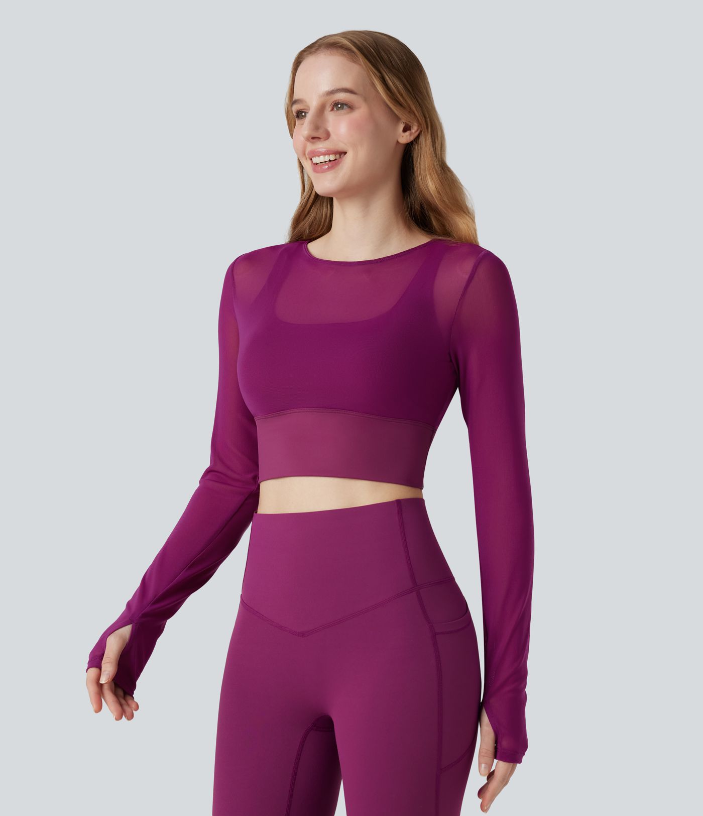 Haut de sport yoga cropped 2-en-1 manches longues mesh contrastant à trous pouces