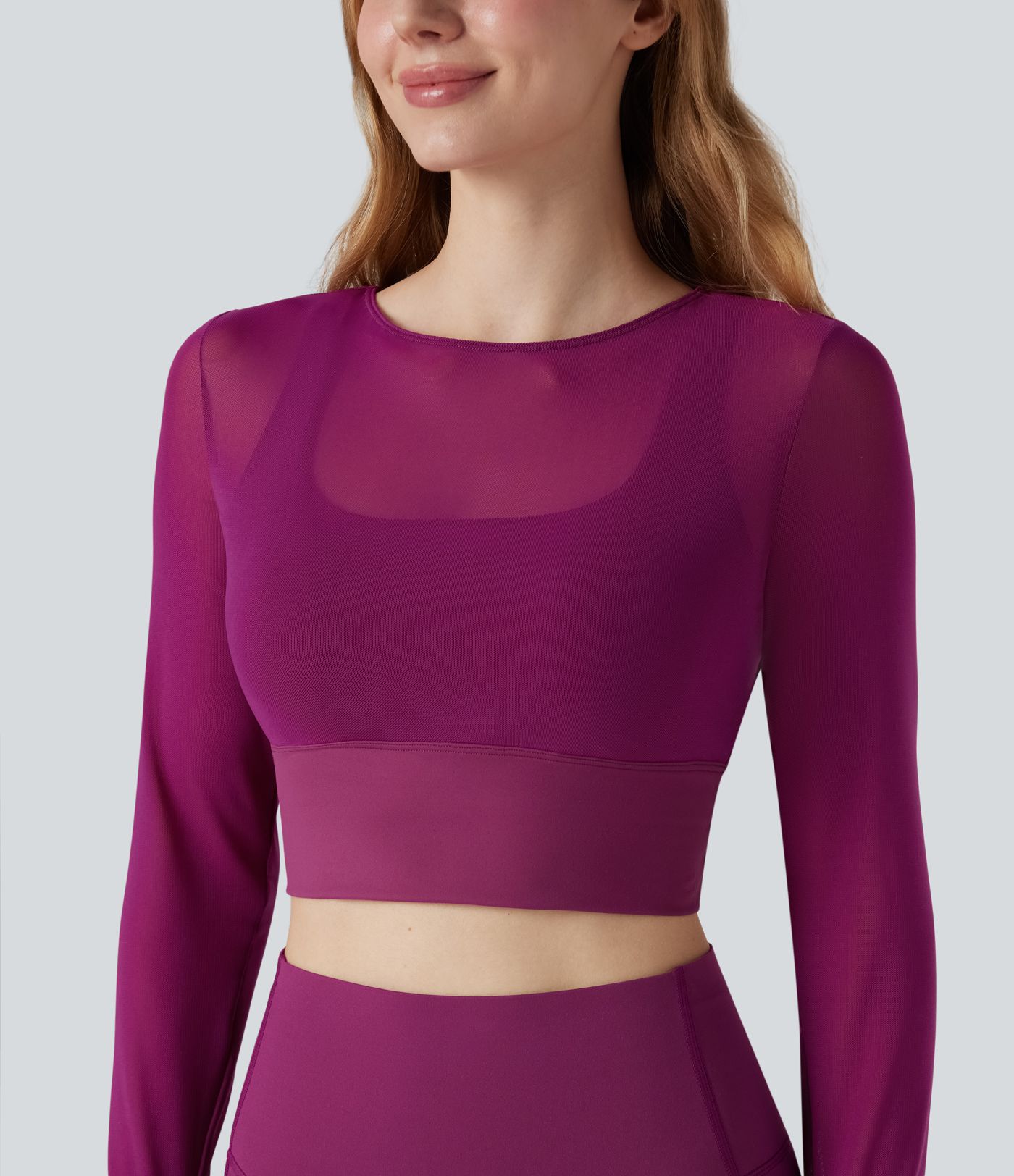 Haut de sport yoga cropped 2-en-1 manches longues mesh contrastant à trous pouces