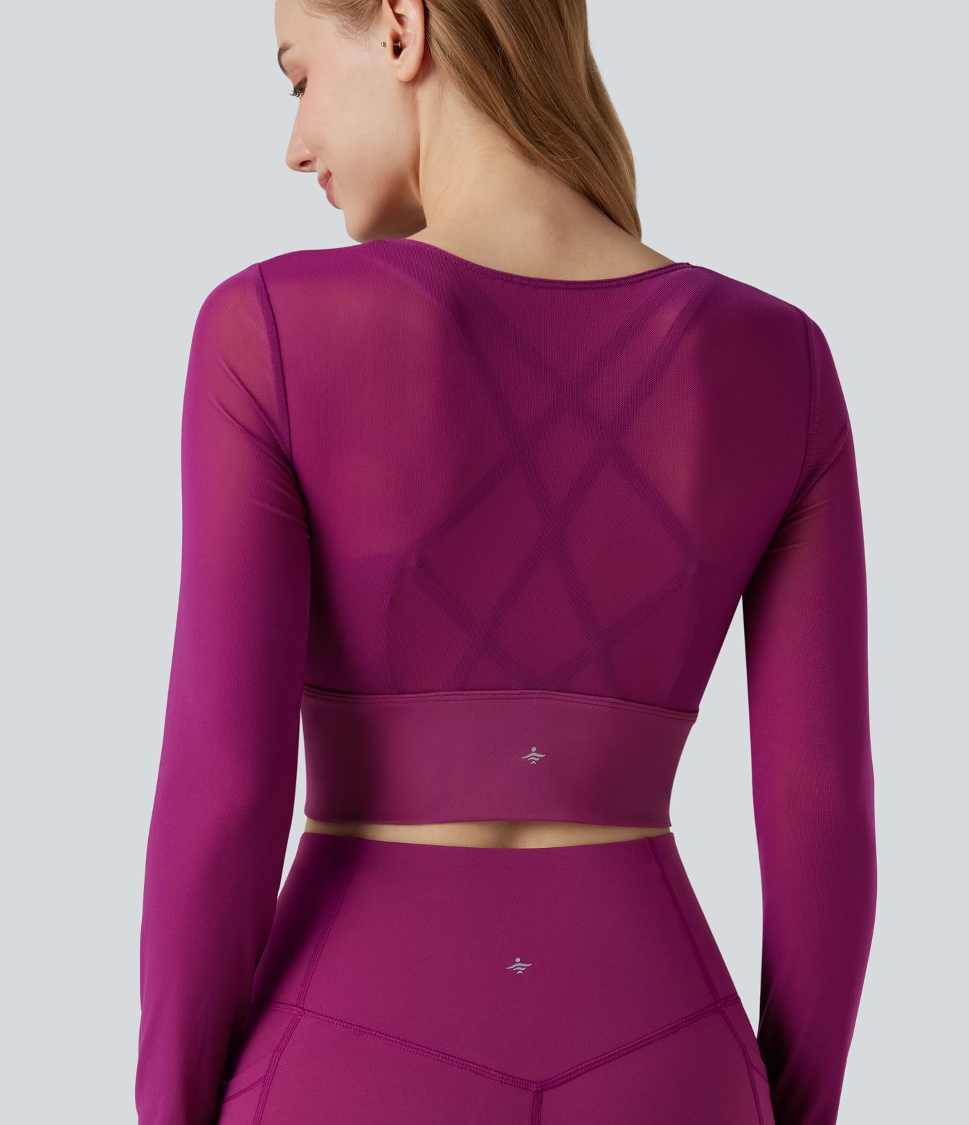 Haut de sport yoga cropped 2-en-1 manches longues mesh contrastant à trous pouces