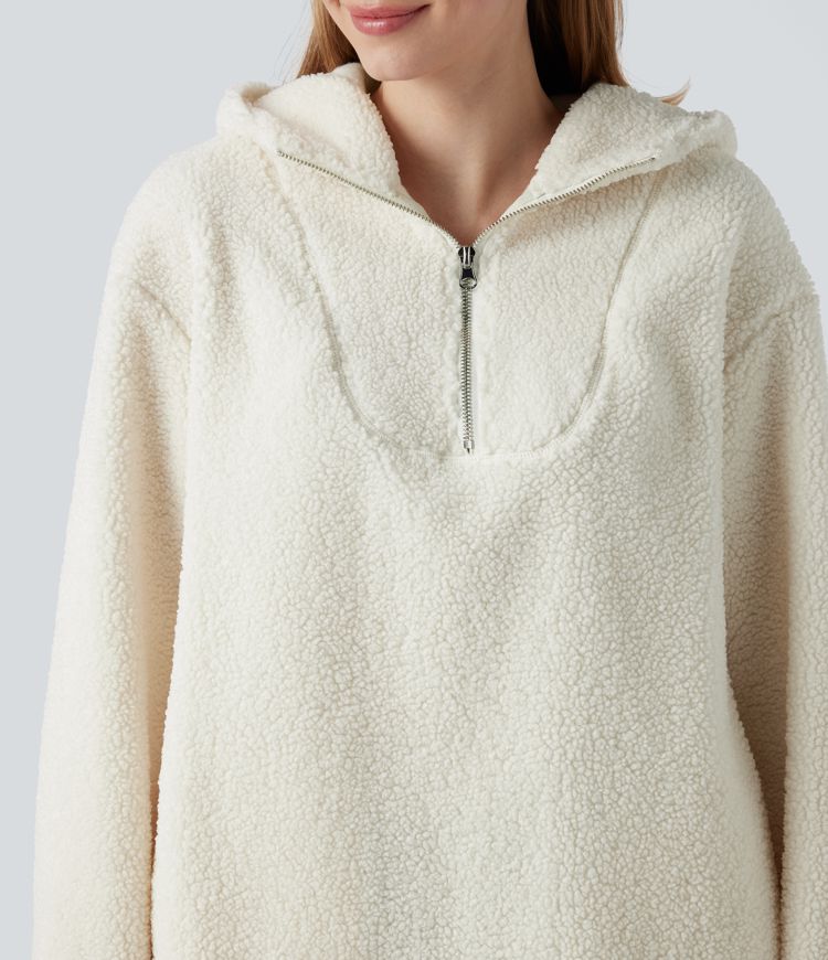 Sherpa oversized sweatshirt with hood and half zip with rounded hem and pockets