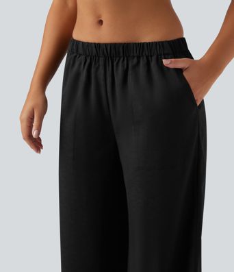 Pantalones holgados de cintura alta estilo resort con bolsillos