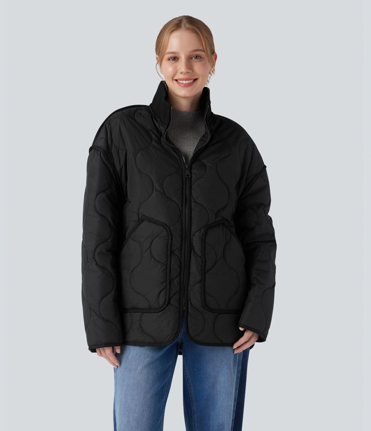 Veste matelassée décontractée zippée à col montant, manches longues et poches.