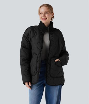 Veste matelassée décontractée zippée à col montant, manches longues et poches.