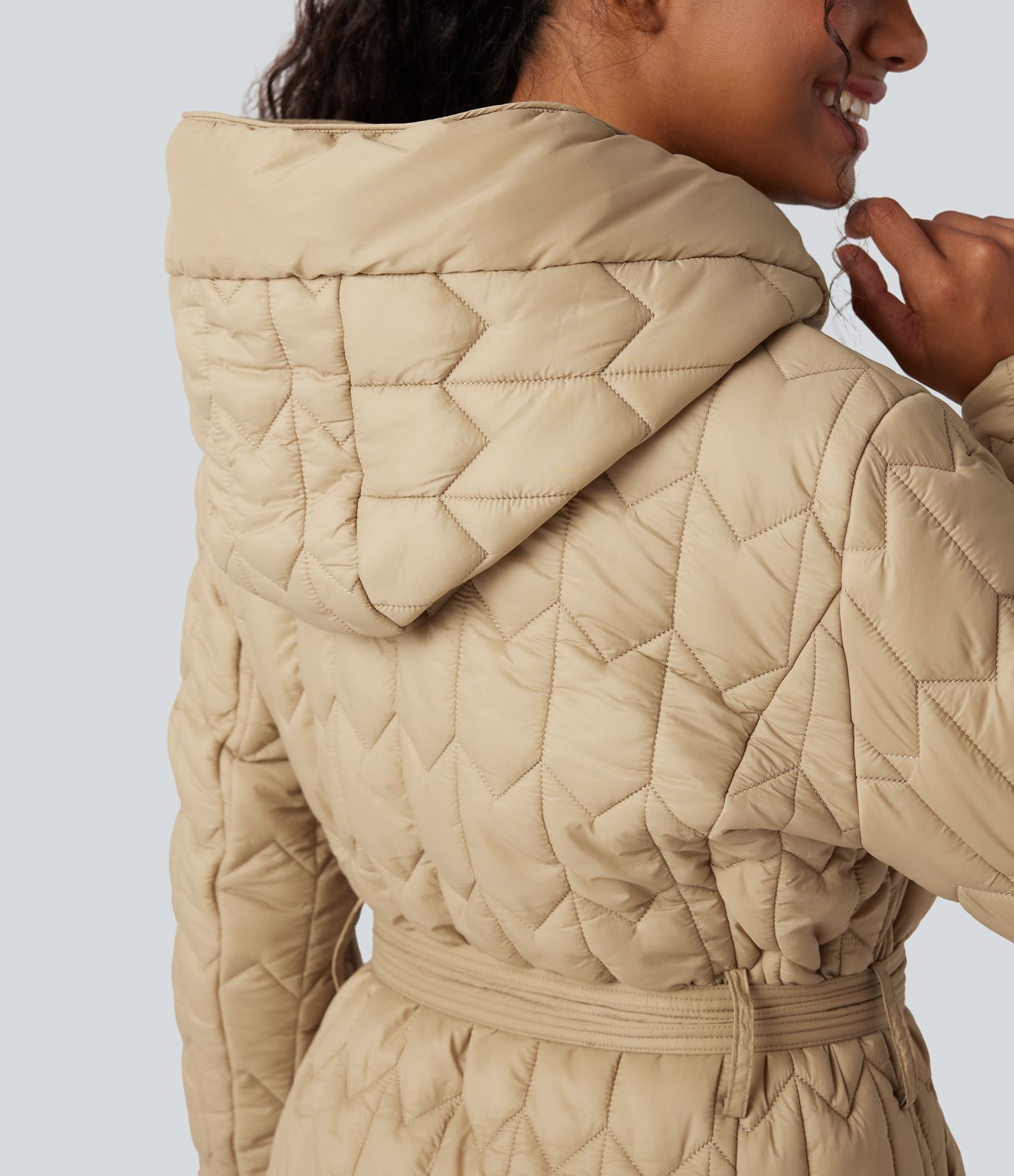 Doudoune longue à capuche avec ceinture et poches