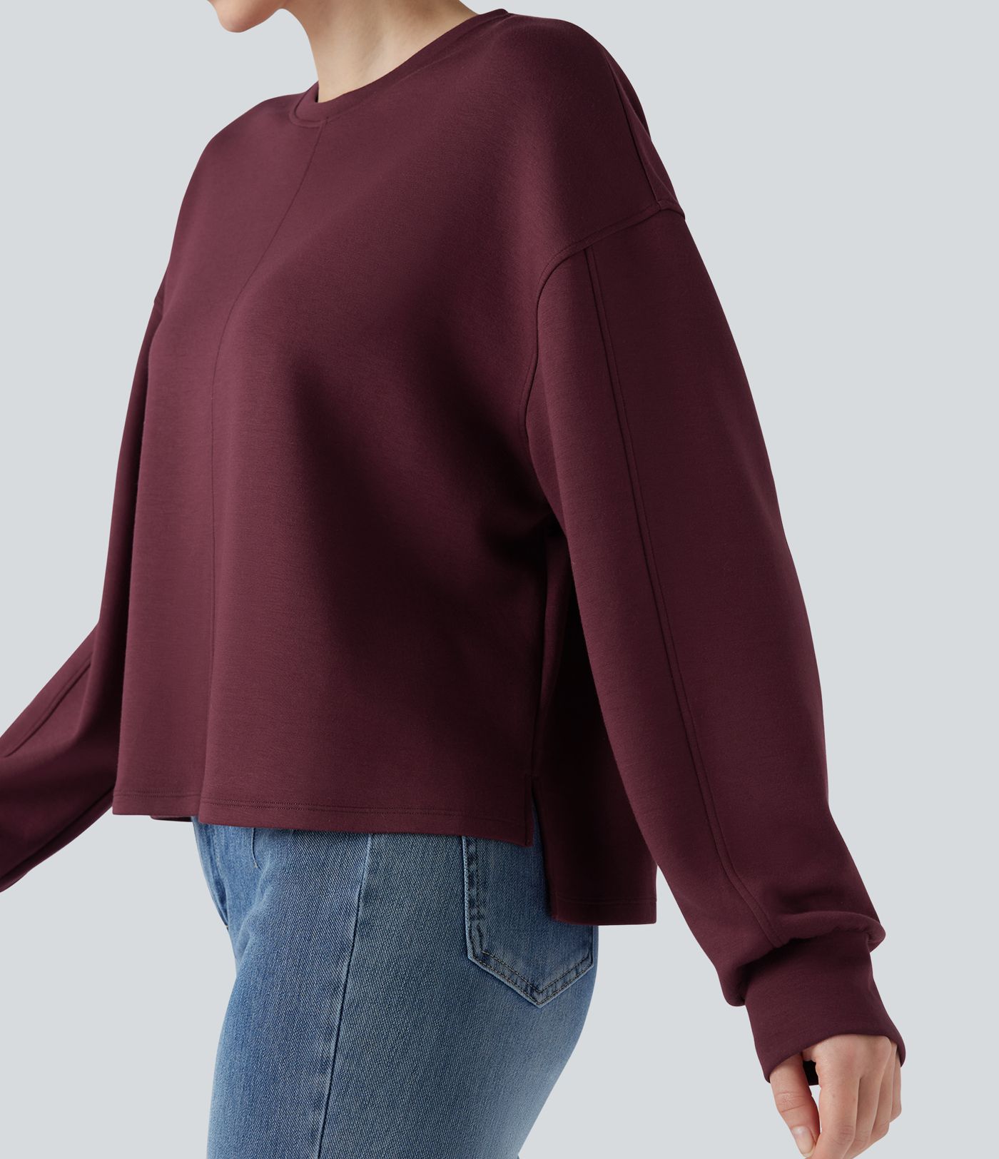 Lässiges Sweatshirt mit Rundhalsausschnitt, langen Ärmeln und High-Low-Design