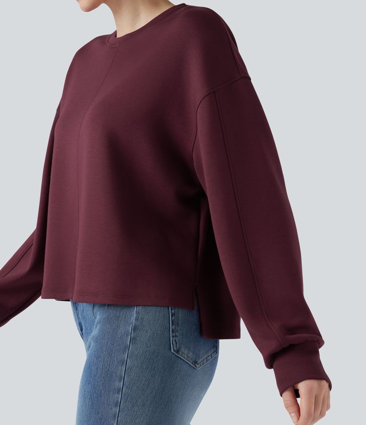 Lässiges Sweatshirt mit Rundhalsausschnitt, langen Ärmeln und High-Low-Design