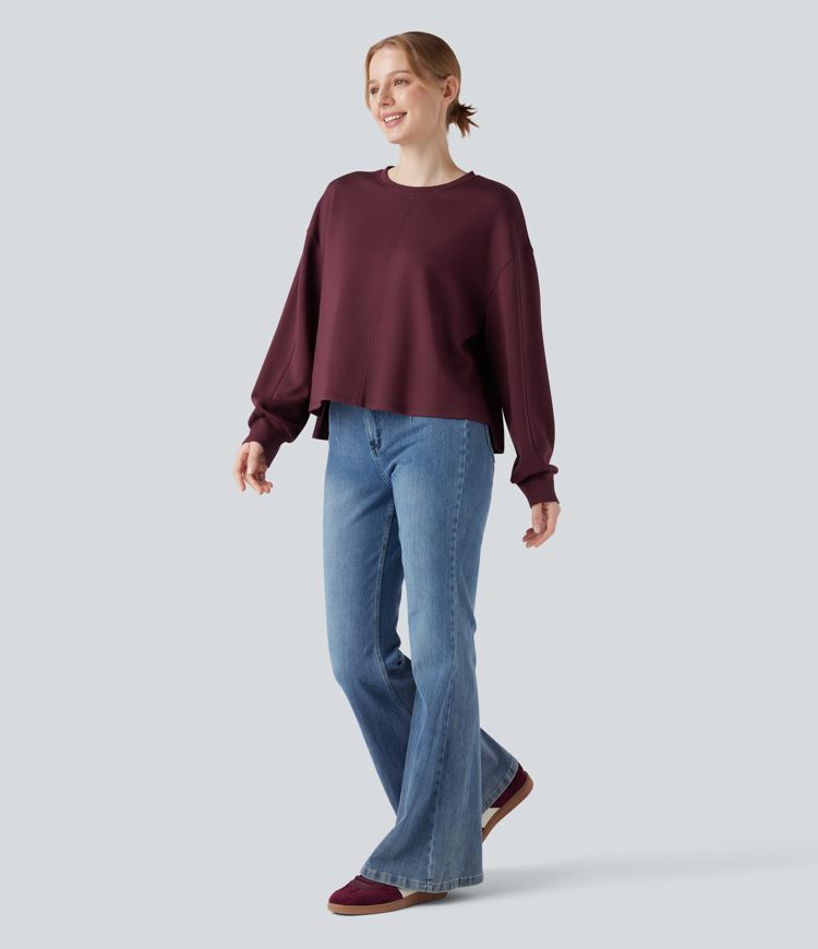 Lässiges Sweatshirt mit Rundhalsausschnitt, langen Ärmeln und High-Low-Design