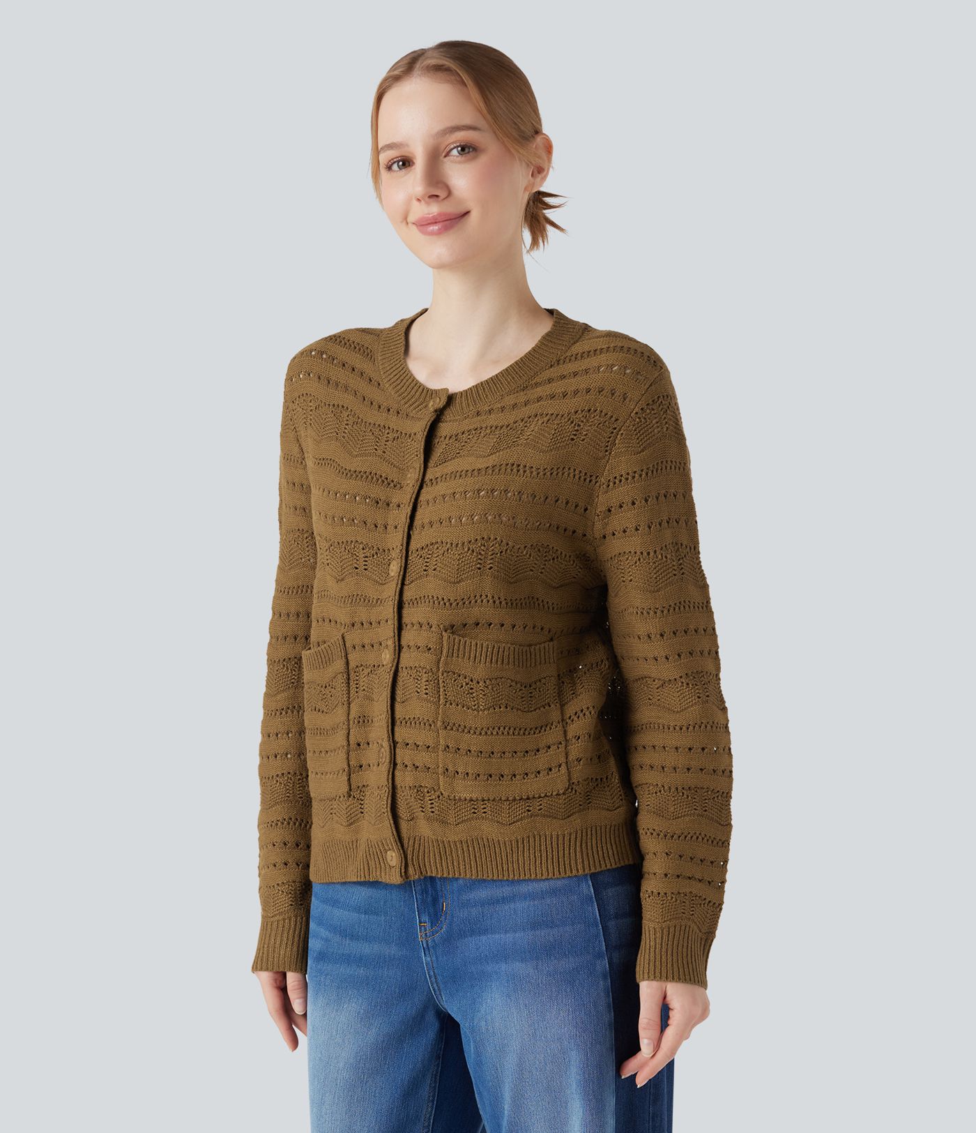Cardigan de travail col rond à manches longues avec boutonnage et découpes avec poches