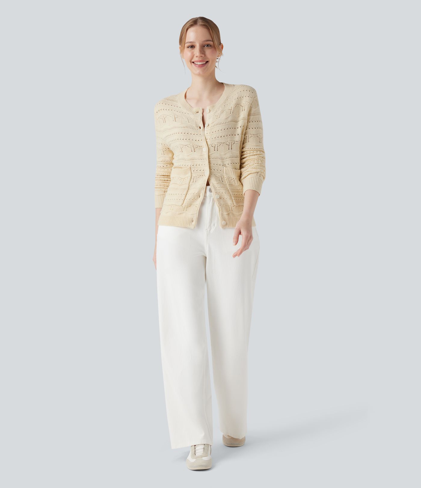 Cardigan de travail col rond à manches longues avec boutonnage et découpes avec poches