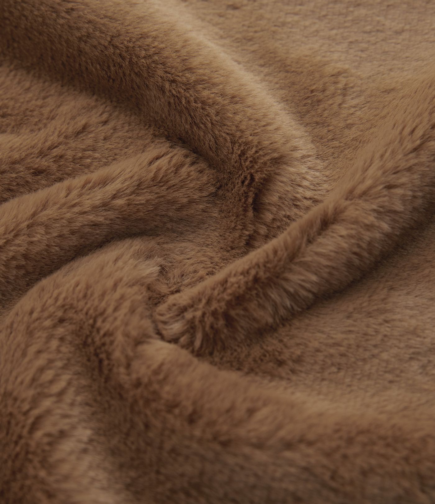 Hooded fleece parka with drawstring, sherpa lining, and pockets