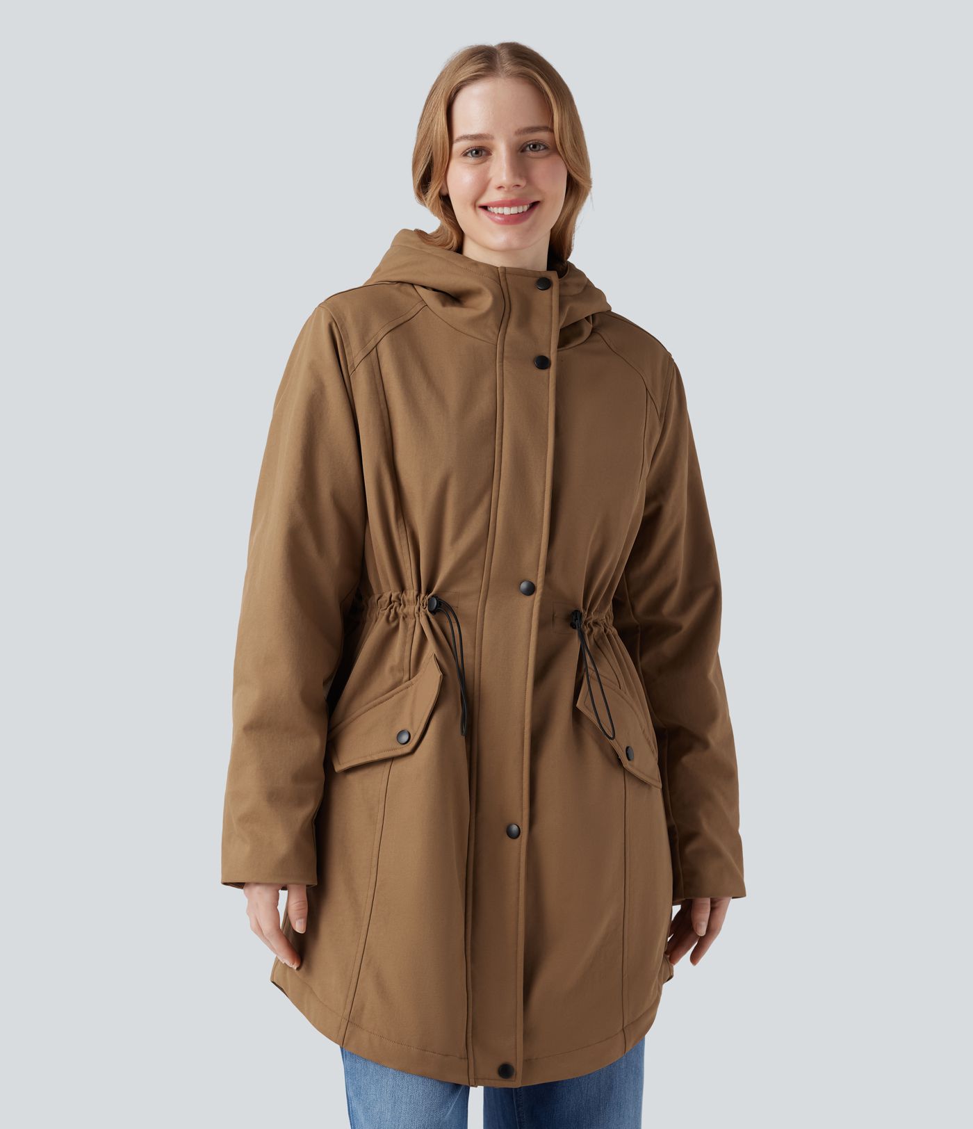 Hooded fleece parka with drawstring, sherpa lining, and pockets