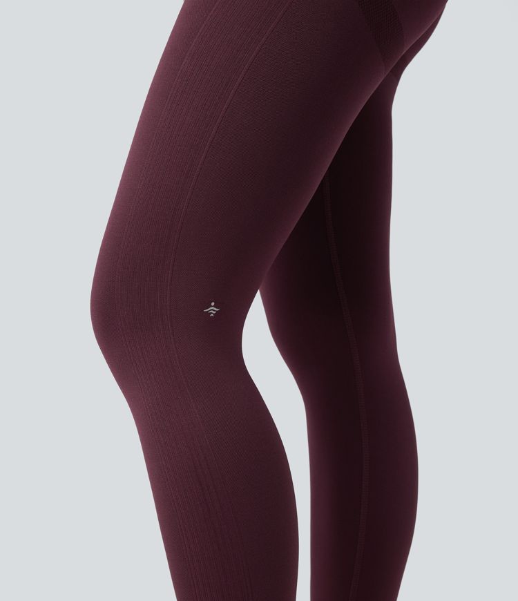 Combinaison d'entraînement ajustée dos nu torsadé sans manches sans couture Seamless Flow