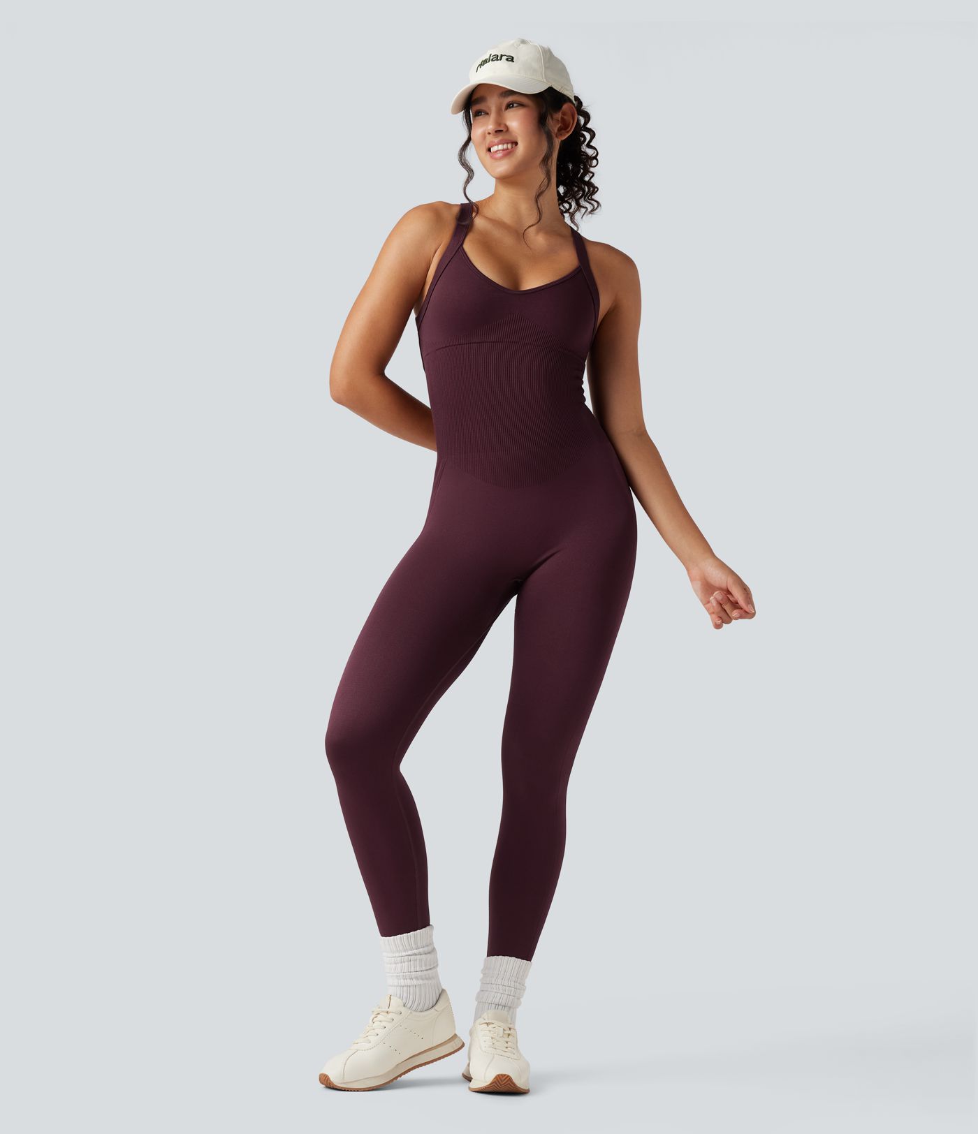 Combinaison de sport Seamless Flow sans coutures, dos torsadé et ouvert, sans manches, coupe moulante