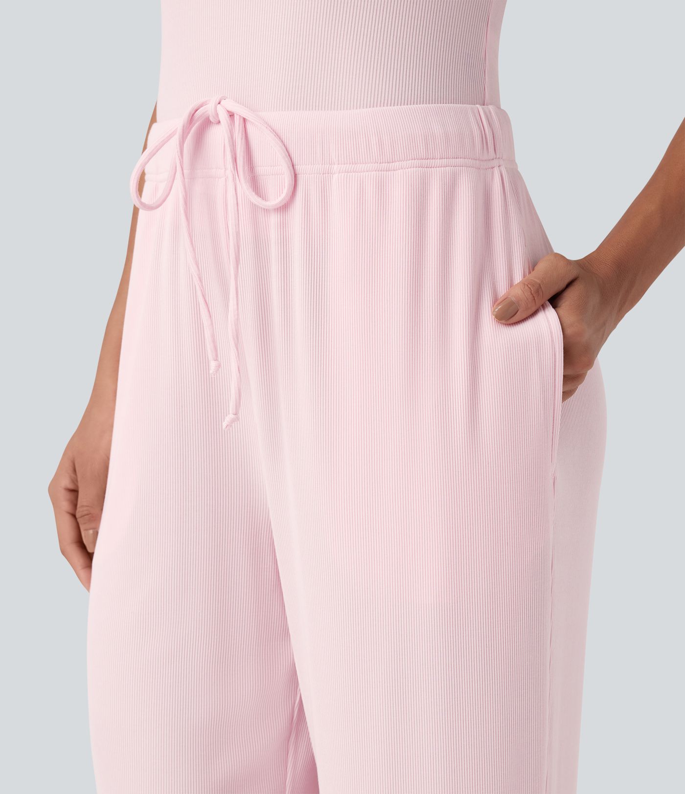 Pantalones lounge de punto acanalado de tiro medio con cordón y bolsillos