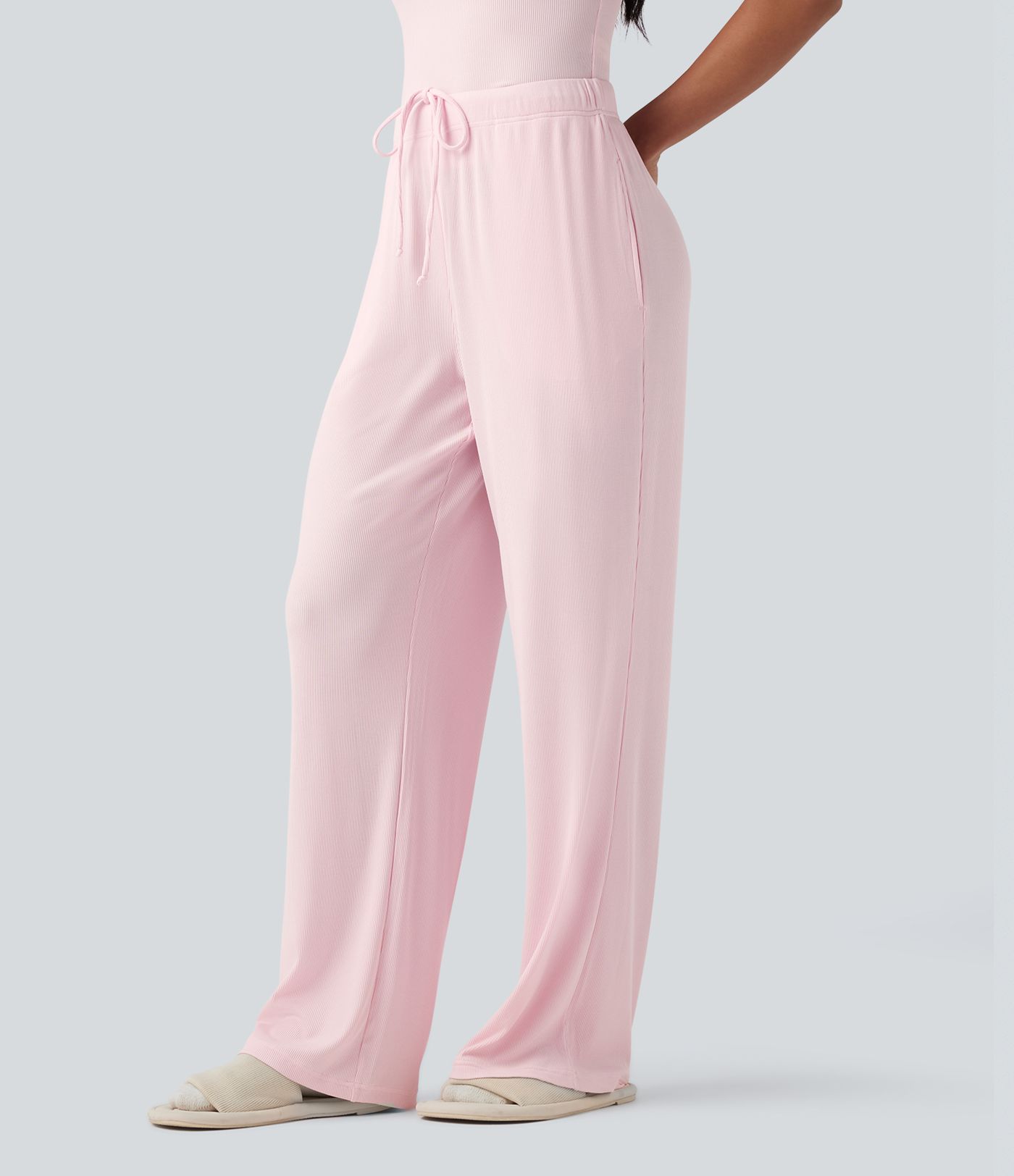 Pantalones lounge de punto acanalado de tiro medio con cordón y bolsillos