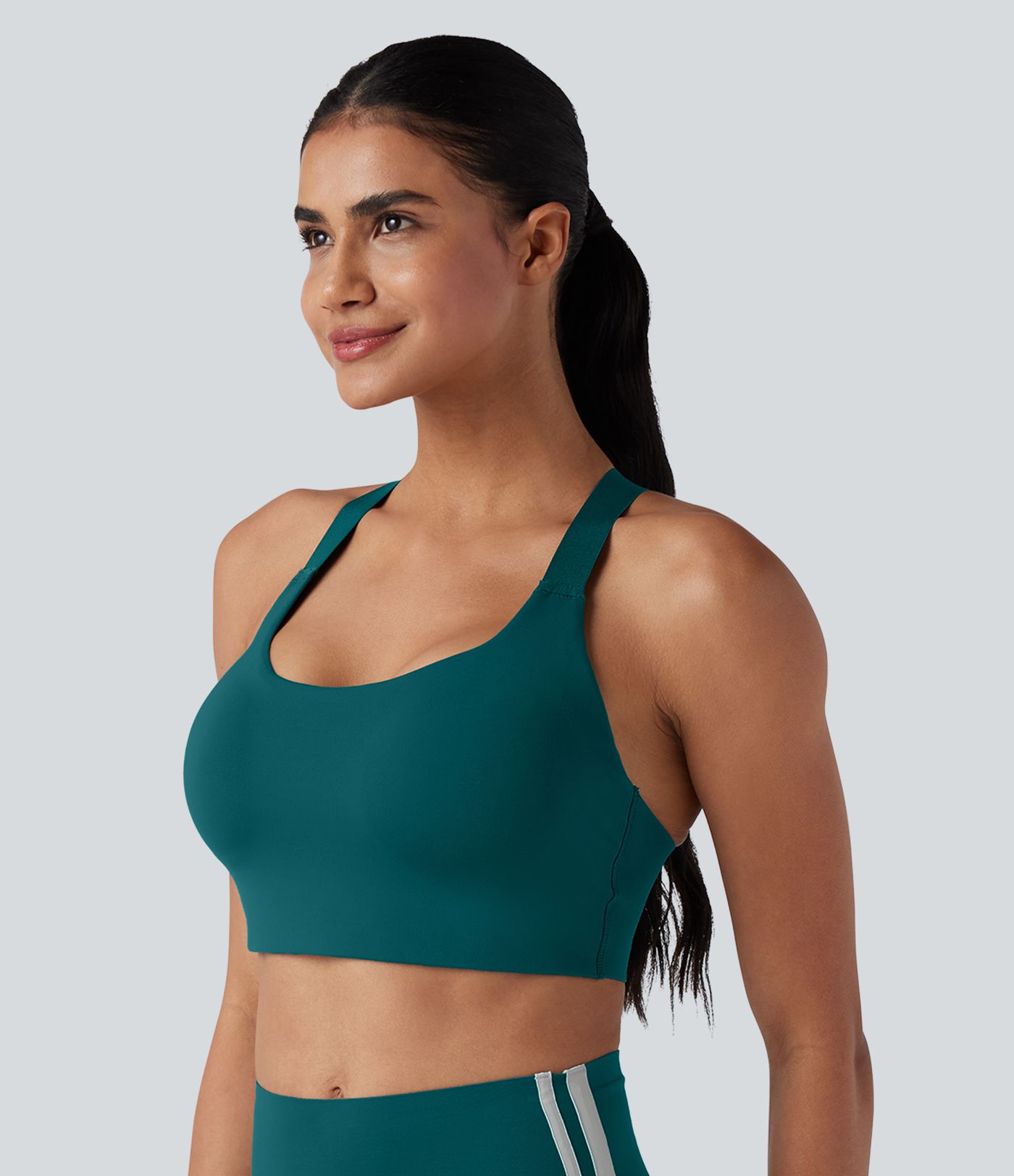 SpeedWave™ Sujetador deportivo para correr con sujeción media, copas moldeadas, efecto push-up, hebilla ajustable, tirantes cruzados, malla en contraste y tejido de secado rápido