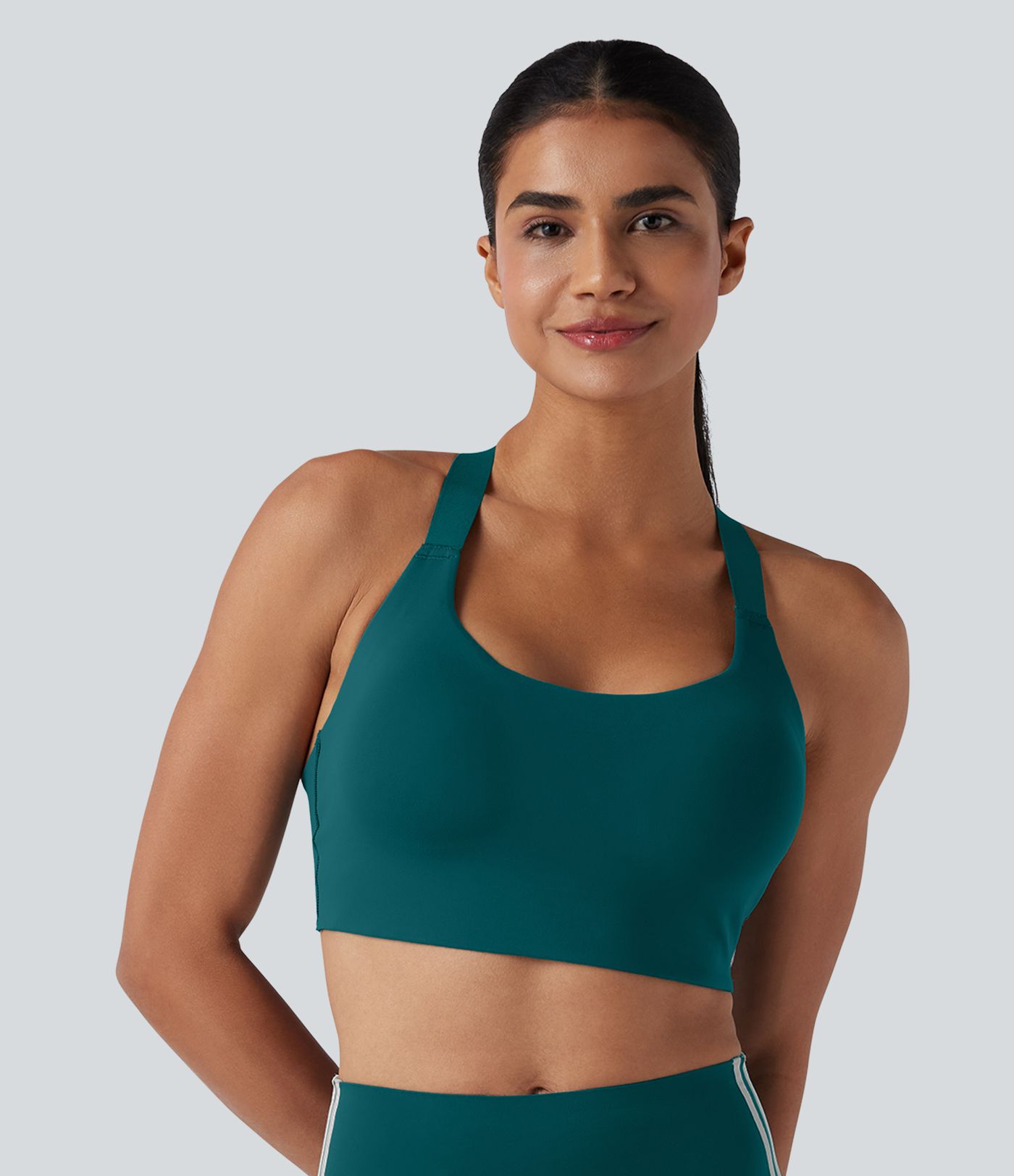 SpeedWave™ Sujetador deportivo para correr con sujeción media, copas moldeadas, efecto push-up, hebilla ajustable, tirantes cruzados, malla en contraste y tejido de secado rápido