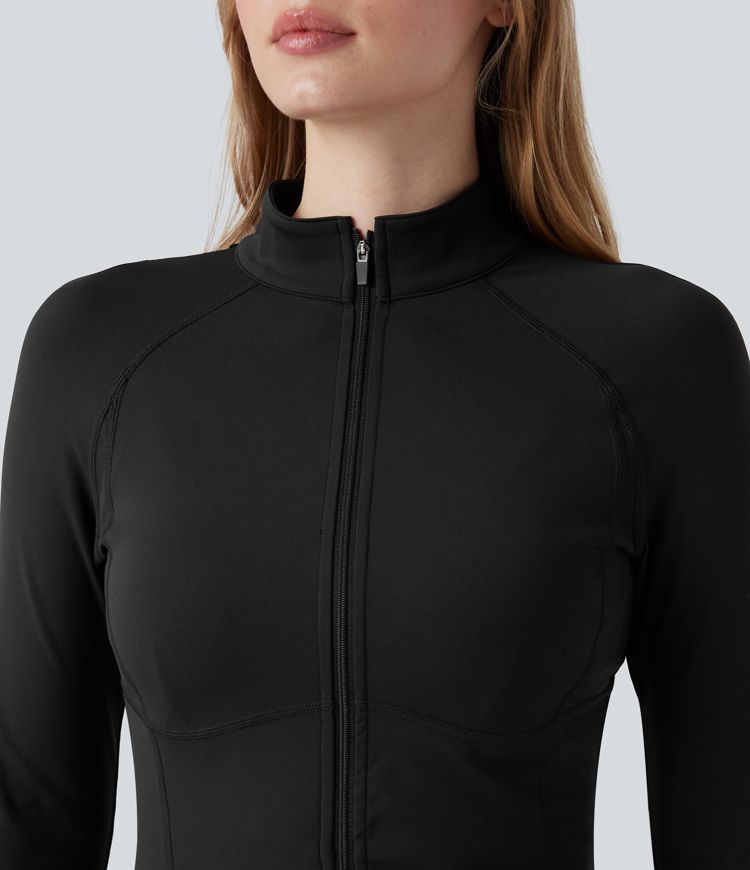 Manteau doudoune court col montant et veste ourlet arrondi avec trous pouces et poche