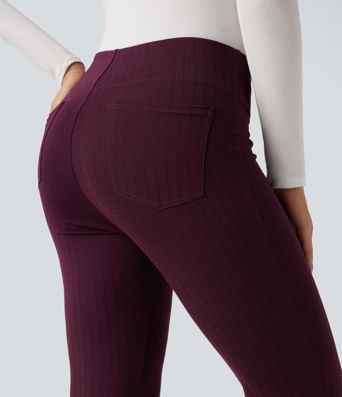 Hoch taillierte, handliche Arbeitshose mit ausgestellten Beinen und Taschen