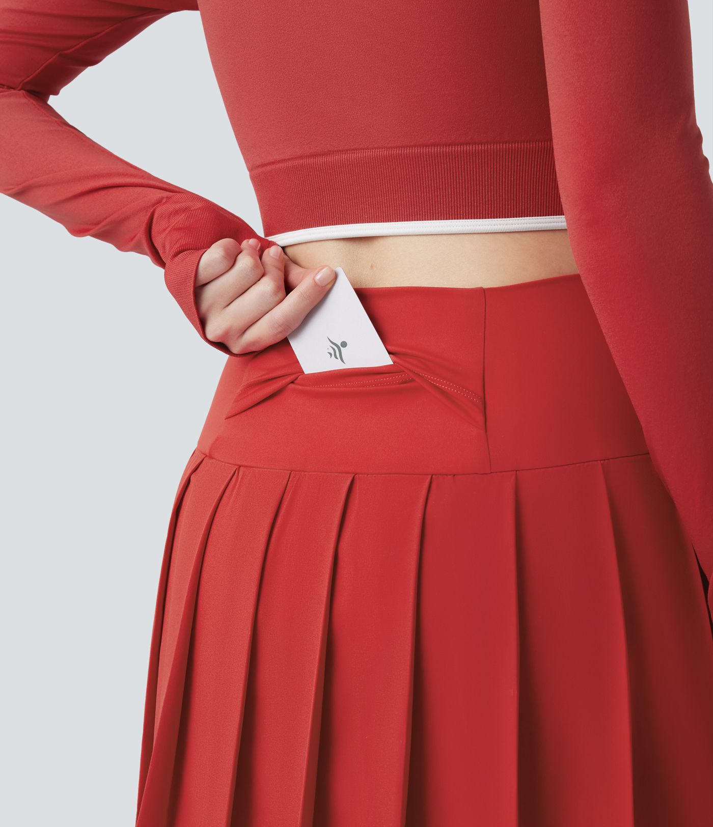 Breezeful™ - Plissierter 2-in-1 Minirock mit hohem Bund, integrierten Leggings, Bundtasche und kontrastierendem Netzgewebe - schnelltrocknend