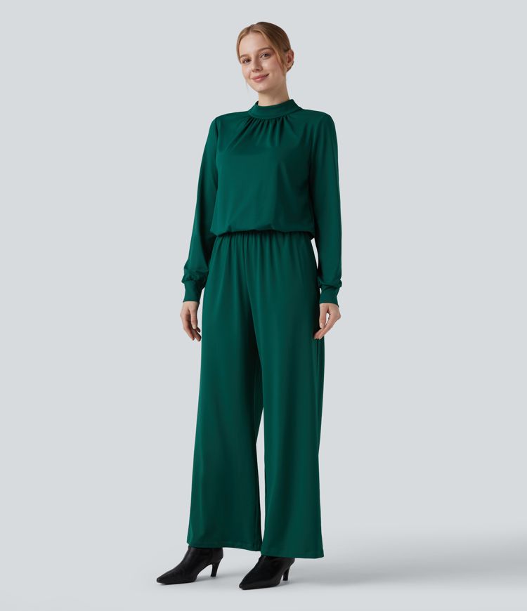 Mono de trabajo con cuello alto corto, abertura en la espalda, mangas largas, pernera ancha y bolsillos