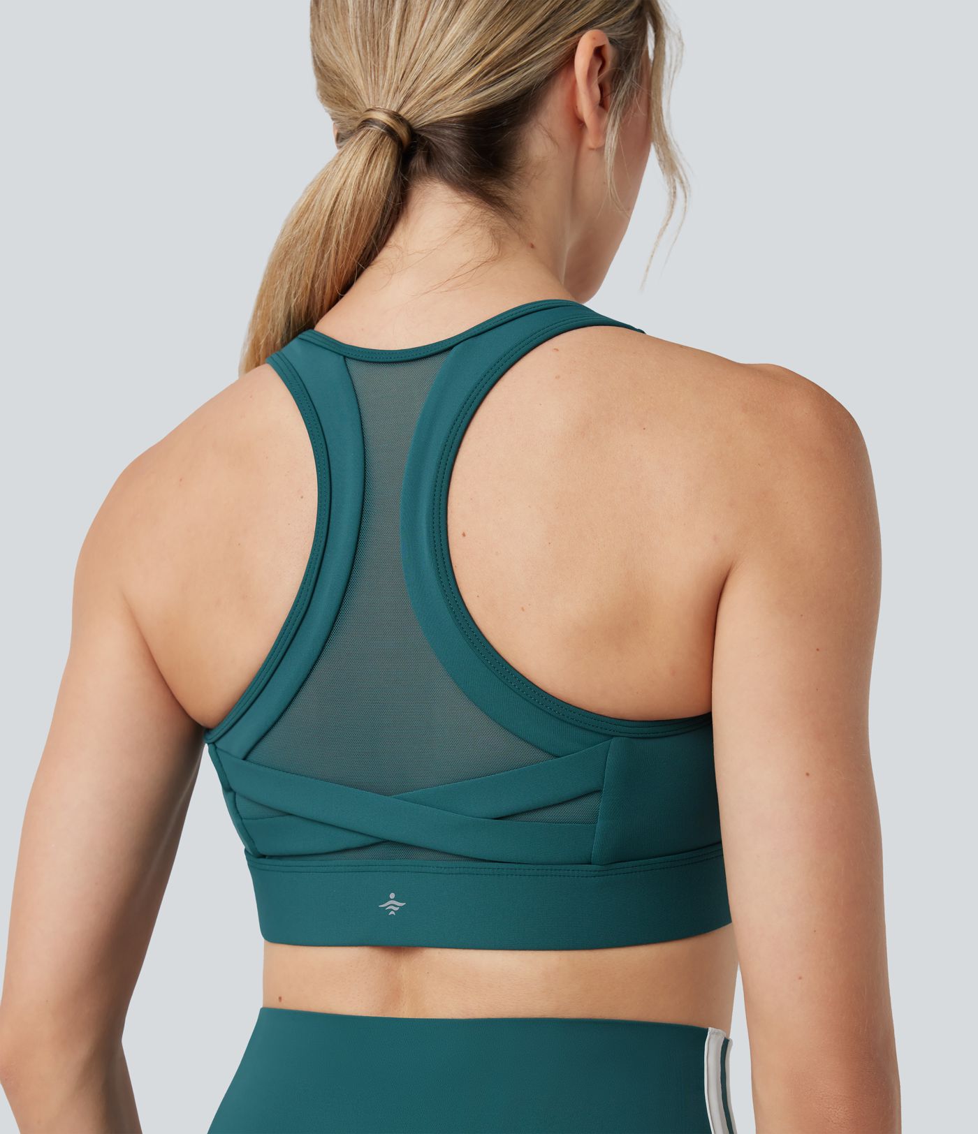 Sujetador deportivo SpeedWave™ para correr con push-up y soporte medio, espalda racerback, paneles de malla a contraste, cremallera y secado rápido.