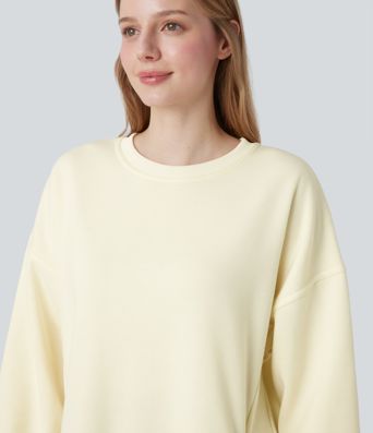 Ohlapna flis jopica z okroglim izrezom, dolgimi rokavi in žepom