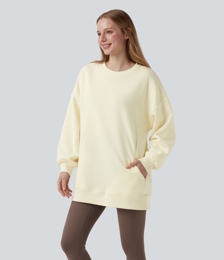 Ohlapna flis jopica z okroglim izrezom, dolgimi rokavi in žepom