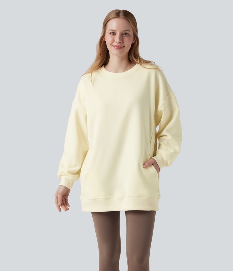 Ohlapna flis jopica z okroglim izrezom, dolgimi rokavi in žepom