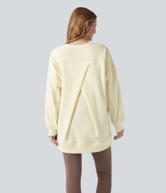 Ohlapna flis jopica z okroglim izrezom, dolgimi rokavi in žepom