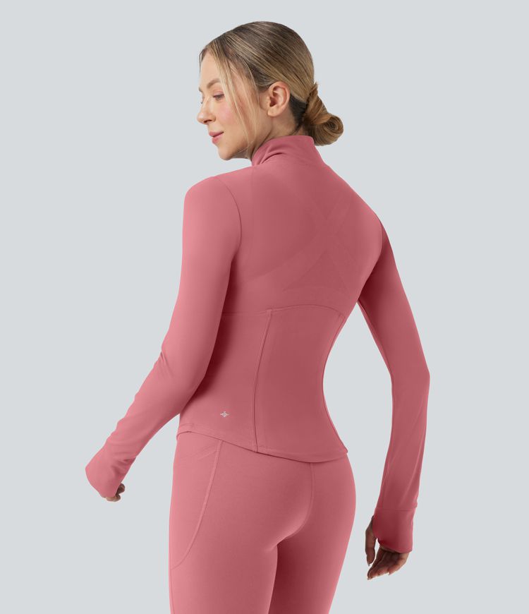 Gilet de yoga Halara UltraSculpt™ à manches longues push-up et taille haute, avec trois poches pour les pouces.
