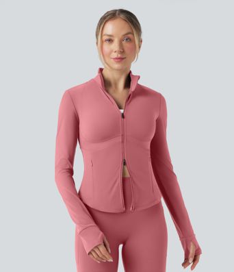 Gilet de yoga Halara UltraSculpt™ à manches longues push-up et taille haute, avec trois poches pour les pouces.