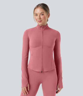 Gilet de yoga Halara UltraSculpt™ à manches longues push-up et taille haute, avec trois poches pour les pouces.
